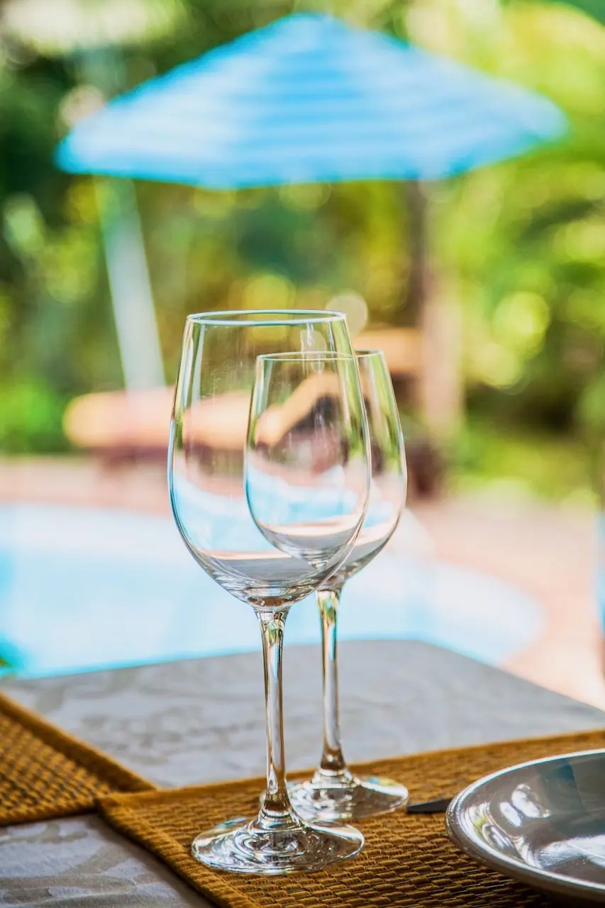 Wine glasses set on the outdoor dining table